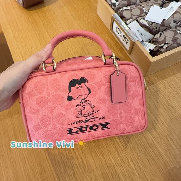 NWT Coach X Peanuts Satchel Crossbody Bag Signature Canvas Lucy CBJ62 Coral
